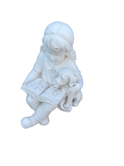 Girl statue reading