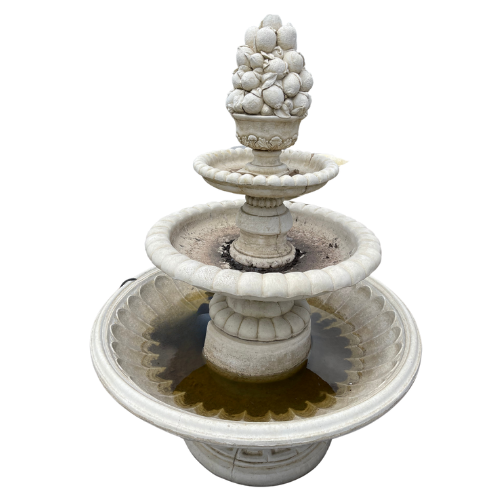 Serene Cascade: The Fruit-Top Fountain